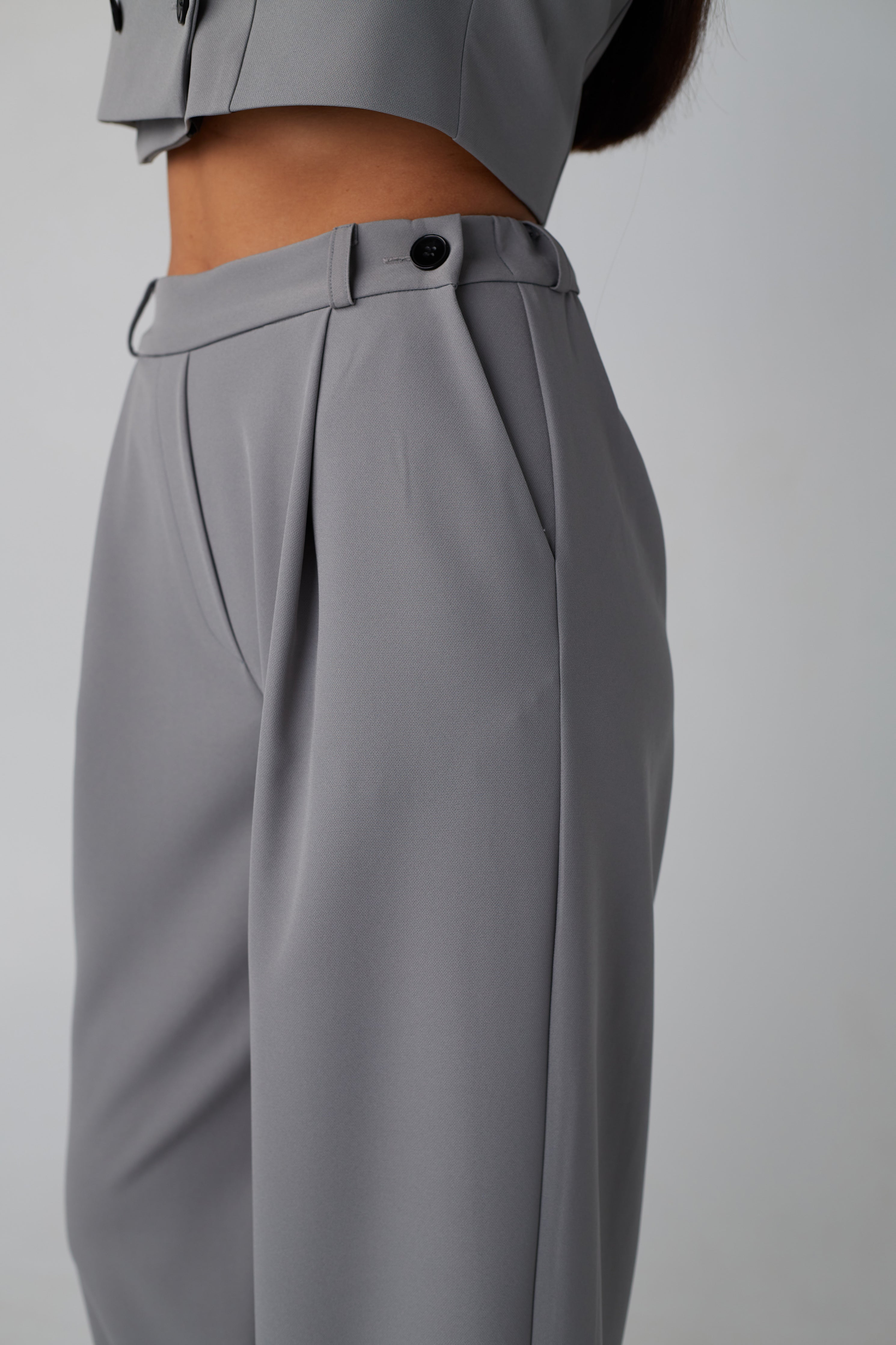 plačios kelnės SPELL pilka